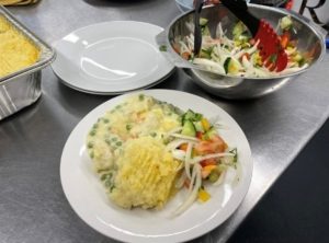 Picture of food with potato and salad